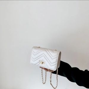 Quilted twist lock chain square bag